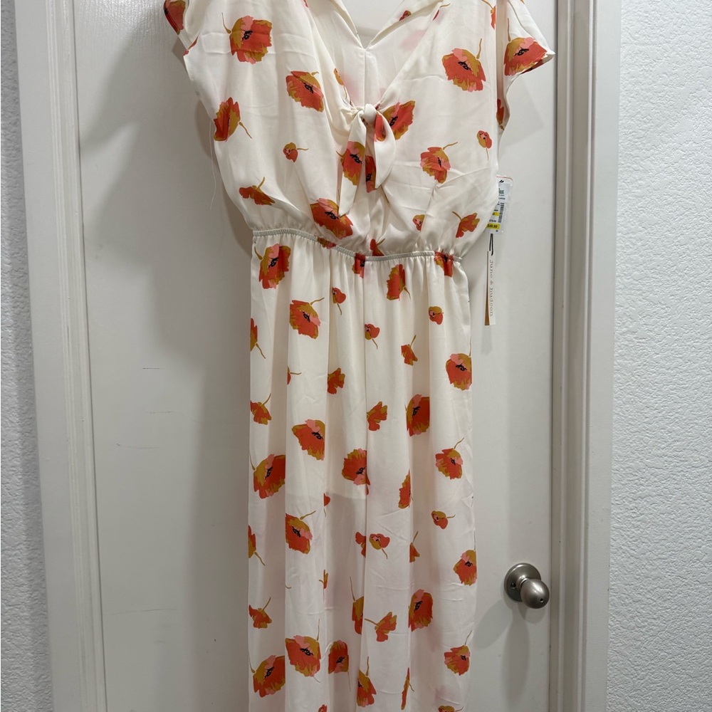 June & Hudson Cream jumpsuit with Red Floral Accents